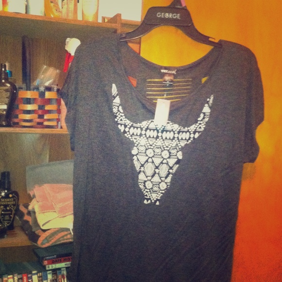 Decorated bull shirt with a sliced up back