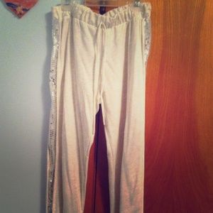 Cream jogger pants with sequence on sides