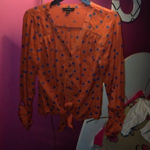 Orange with blue polka dots tie up top