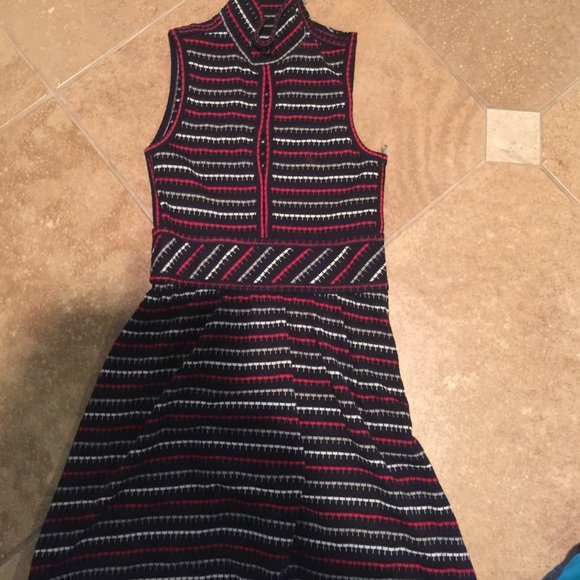 Stunning mini dress with peep holes on the top