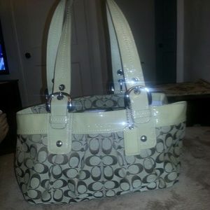 Beige coach signature handbag