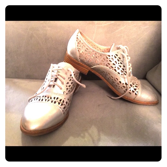 SOLD::::Silver cutout spats