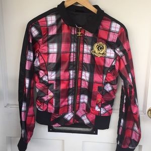 A plaid red black and white jacket