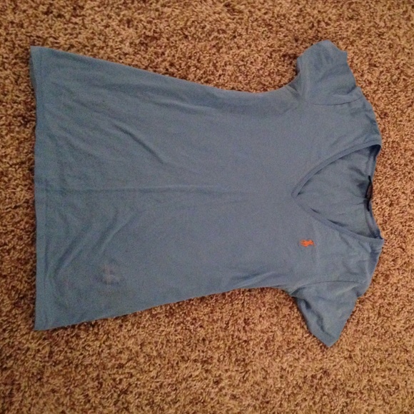 Blue polo t shirt with orange horse