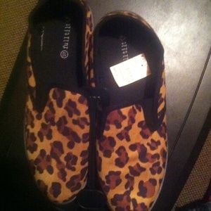 Leopard print slip on shoes.