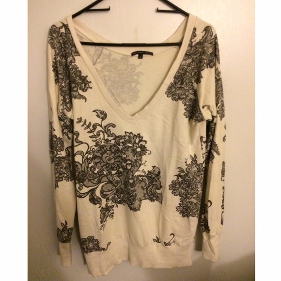 White and black patterned sweater