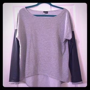Faux leather sleeve sweater