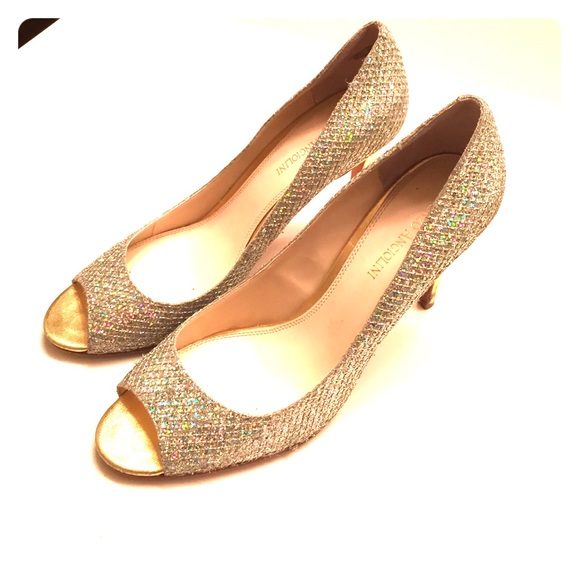 Silver and gold sparkle peep toe pumps.