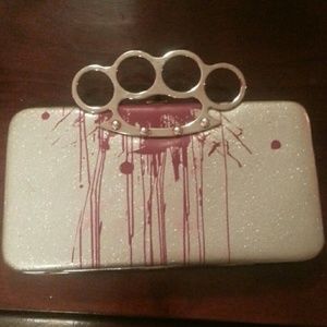 Brass knuckle wallet