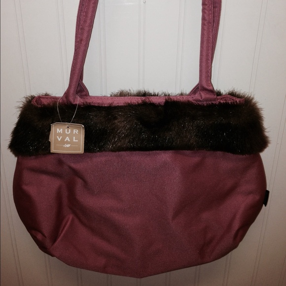 Pink purse with faux fur trim