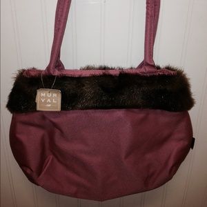 Pink purse with faux fur trim
