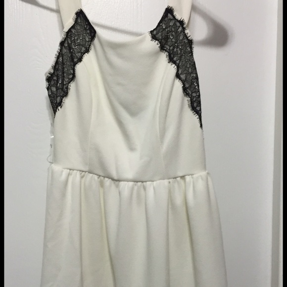 Adorable cream and black lace dress