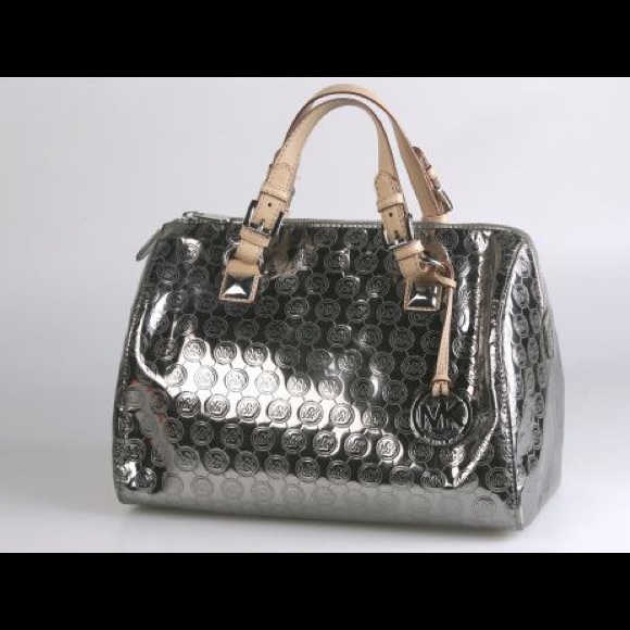 Michael Kors Handbags - $130  Authentic Michael Kors bag.