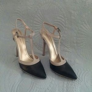 BCBGENERATION  LEATHER T STRAP HEEL.