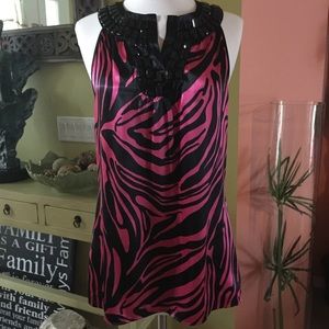 Michael Kors red sleeveless top.