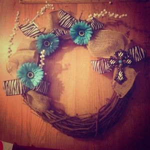 Hand made vine wreath with burlap accent and cross
