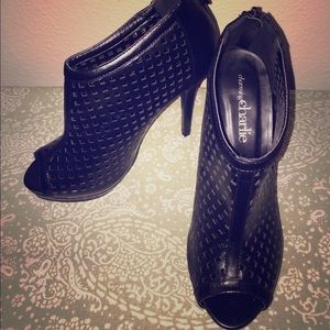 Open toe black boot heel