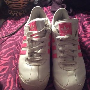 Pink and white Adidas