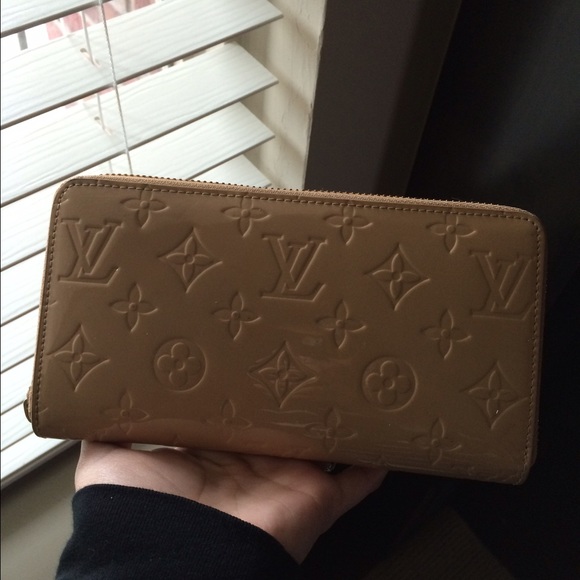 Cream colored LV wallet