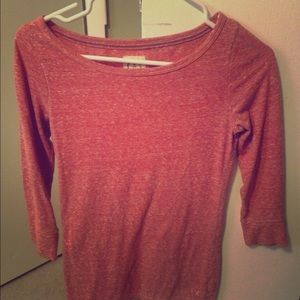 A short long sleeve pink shirt