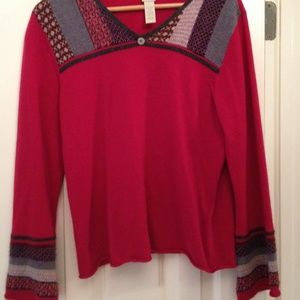 Red sweater with shoulder & sleeve detail, size L.