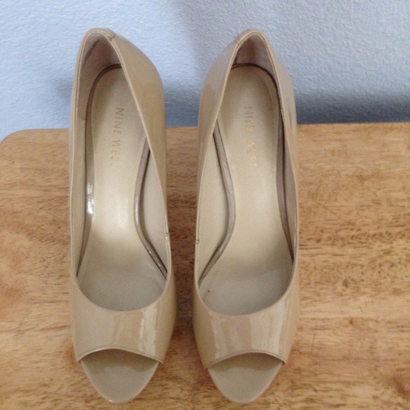 Nine West beige platform heels.