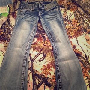 Reign tight fitting boot cut jeans