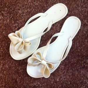Tan Bow Flip Flops