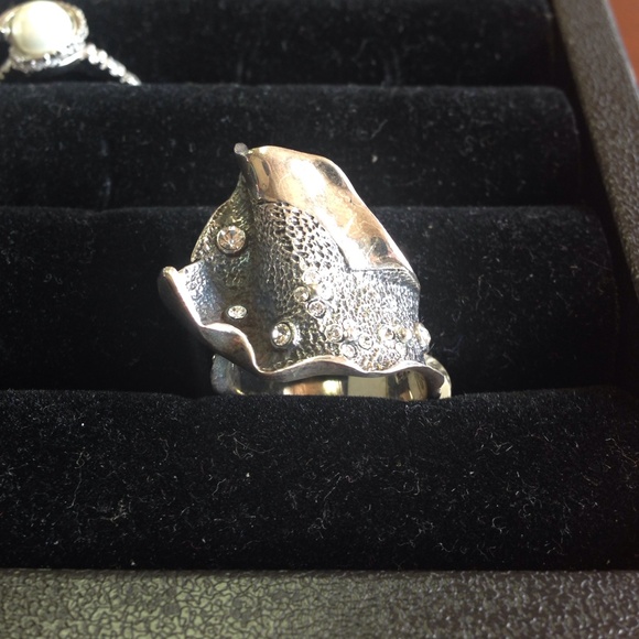 Cute 925 silver with clear stones.