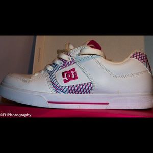DC skate shoes, white with blue and pink stripes.