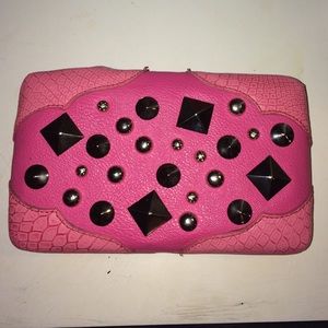 Pink clutch with studs