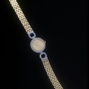 Woman's pulsar watch.