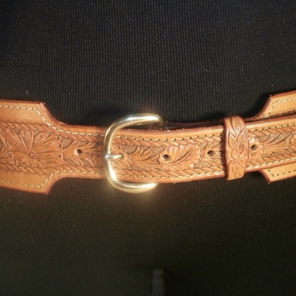 100% hand carved leather belt.