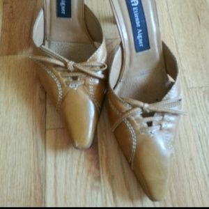 Neutral leather mules by Etienna Aigner