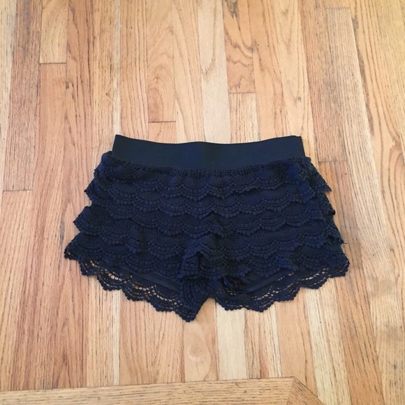 Black ruffled shorts