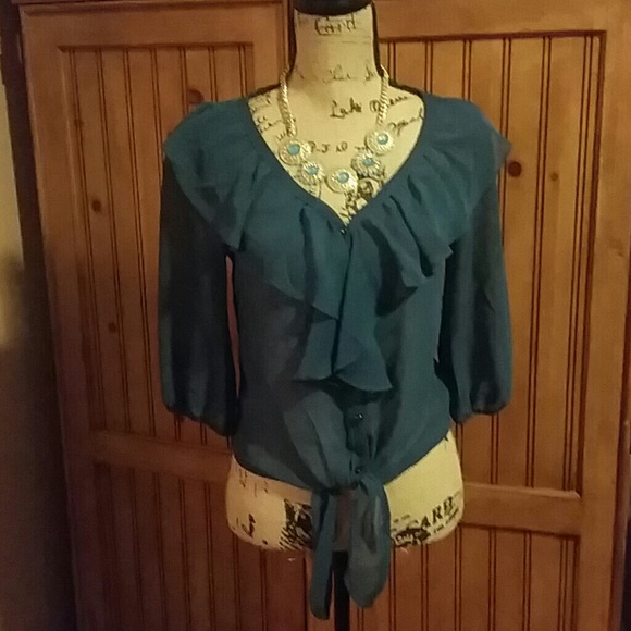 Sweet sheer tie front  ruffle blouse.