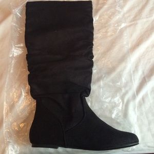 Tall black boots