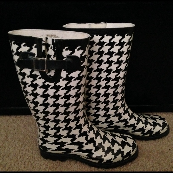 Black and white rain boots