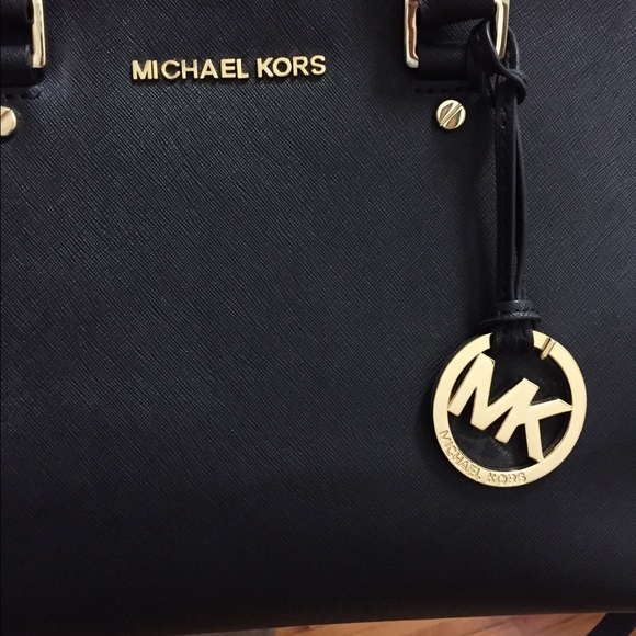 BRAND NEW Michael Kors medium black Selma satchel.