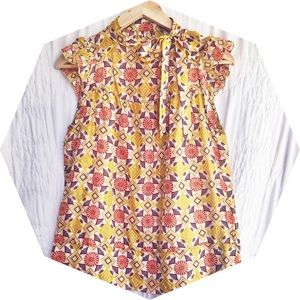 Sensuous silk blouse by Tref for Antgropologie.