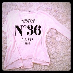 A long sleeve knit top.