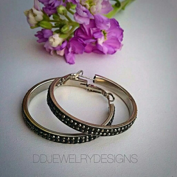 A pair of earrings
