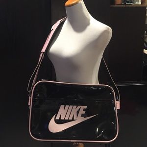 Pink and black nike gym bag