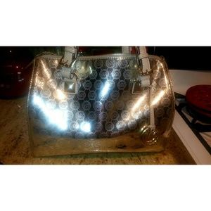 Michael Kors Gold Purse Brand New only wore 4 time