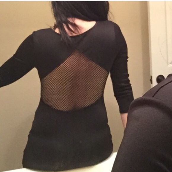 Sexy little backless dress with mesh cut outs!