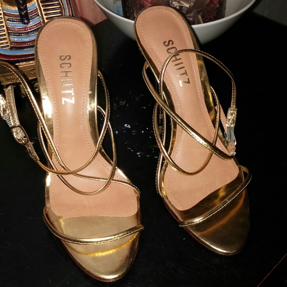 Gold heels About 4inches super elegant  never worn