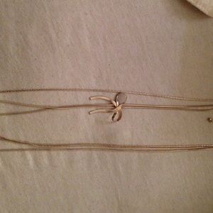 Gold chain bow necklace