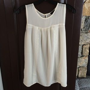 Topshop size 2 cream colored sleeveless top.