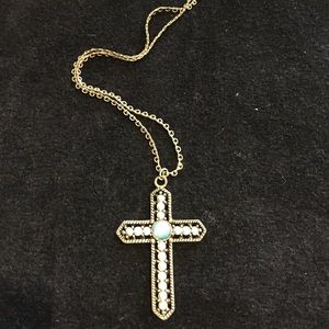 Silver and blue stone cross necklace