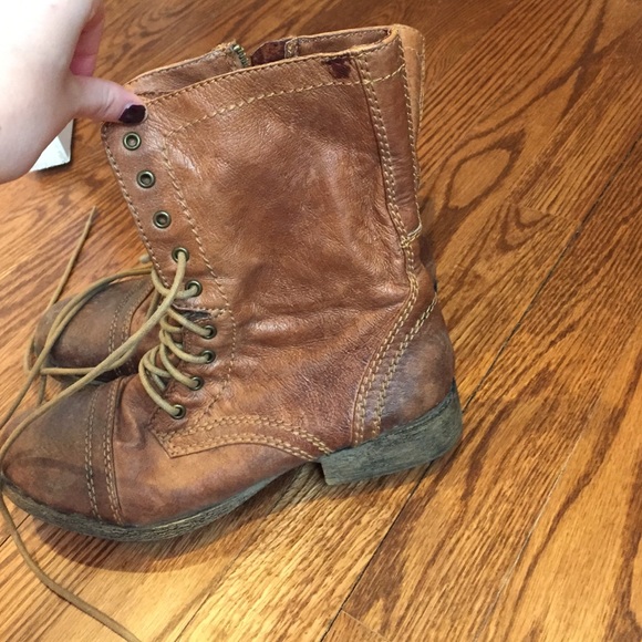 Distressed tan combat boots